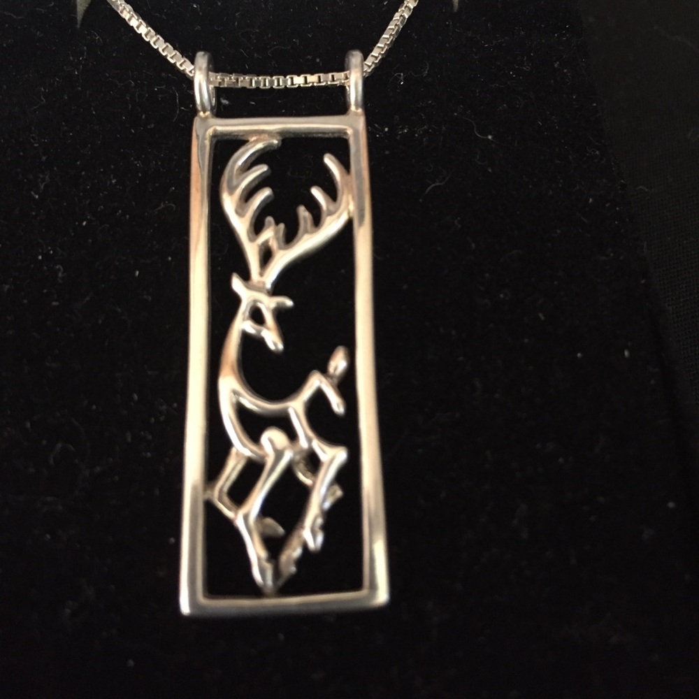Sterling silver deer necklace.